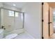 The bathroom features a shower and tub combination and white tile flooring at 140 Grosvenor Pl, Atlanta, GA 30328