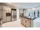 Modern kitchen with granite countertops, stainless steel appliances and an island at 140 Grosvenor Pl, Atlanta, GA 30328