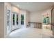 Kitchen features a cozy built-in desk and access to the backyard deck at 140 Grosvenor Pl, Atlanta, GA 30328