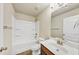 Well-lit bathroom with vanity, toilet and bath-shower combo at 3777 Shady Maple Dr, Lithonia, GA 30038