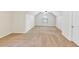 A large, carpeted bedroom with a window, and neutral paint at 3777 Shady Maple Dr, Lithonia, GA 30038