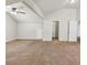 Spacious carpeted bedroom with a ceiling fan, storage closet and ensuite bathroom at 3777 Shady Maple Dr, Lithonia, GA 30038