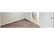 Bedroom with neutral carpeting, fresh paint and a doorway at 3777 Shady Maple Dr, Lithonia, GA 30038
