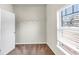 Walk-in closet with a window, fresh paint, shelving and neutral carpeting at 3777 Shady Maple Dr, Lithonia, GA 30038
