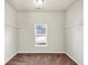 Spacious walk-in closet with a window and shelving at 3777 Shady Maple Dr, Lithonia, GA 30038