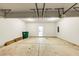 Clean and spacious garage with an exterior door at 3777 Shady Maple Dr, Lithonia, GA 30038