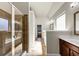 Bright main bathroom featuring a glass shower and soaking tub at 3777 Shady Maple Dr, Lithonia, GA 30038