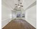 Spacious main bedroom with ceiling fan and tray ceiling at 3777 Shady Maple Dr, Lithonia, GA 30038