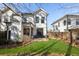 Beautiful backyard with lush green grass, a patio, and privacy fence at 411 Johnson Ct, Alpharetta, GA 30009