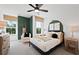 A beautifully decorated bedroom with natural light and a unique color palette at 130 Briargate Dr, Johns Creek, GA 30097