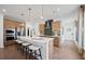 Well-appointed kitchen featuring a large center island, stainless steel appliances, and ample counter space at 130 Briargate Dr, Johns Creek, GA 30097