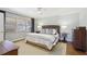 Bright bedroom with large windows, ceiling fan, and comfortable furnishings at 3902 Sheldon Ne Dr, Atlanta, GA 30342