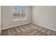 Bedroom with window and neutral colors, plus carpet at 4260 Mason Creek Rd, Winston, GA 30187