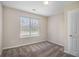 Neutral bedroom with plush carpeting and bright window at 4260 Mason Creek Rd, Winston, GA 30187
