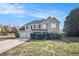 Charming two-story home featuring a two-car garage and a combination of siding and stone accents at 4260 Mason Creek Rd, Winston, GA 30187