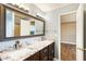 Bathroom featuring double sinks with granite countertops at 3165 Pucketts Mill Rd, Buford, GA 30519