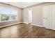 Empty bedroom with hardwood floors and natural light at 3165 Pucketts Mill Rd, Buford, GA 30519