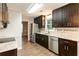 Modern kitchen showcasing granite countertops, stainless steel appliances, and hardwood floors at 3165 Pucketts Mill Rd, Buford, GA 30519