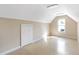 Bright and airy attic space featuring a large window and clean finishes, offering versatile potential at 4610 Wynmeade Ne Park, Marietta, GA 30067