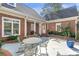 Private patio with outdoor seating, perfect for enjoying the landscaped backyard at 4610 Wynmeade Ne Park, Marietta, GA 30067
