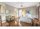 Cozy bedroom with hardwood floors, neutral walls, and classic furniture accents at 4610 Wynmeade Ne Park, Marietta, GA 30067