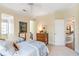 Bedroom featuring two twin beds, neutral walls and carpet, and classic wood furniture at 4610 Wynmeade Ne Park, Marietta, GA 30067