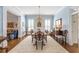 Formal dining room with classic decor, large windows, and hardwood flooring at 4610 Wynmeade Ne Park, Marietta, GA 30067