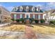 Beautiful home with brick facade, manicured landscaping, and inviting entryway at 4610 Wynmeade Ne Park, Marietta, GA 30067