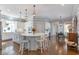 Spacious kitchen with white cabinets, a large island, and an adjacent dining area at 4610 Wynmeade Ne Park, Marietta, GA 30067