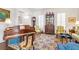 Cozy living room featuring a piano, fireplace, and traditional furnishings at 4610 Wynmeade Ne Park, Marietta, GA 30067