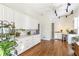 Bright room with built-in white cabinets, a sink, and sleek track lighting at 4610 Wynmeade Ne Park, Marietta, GA 30067