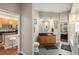 Bathroom featuring a vanity with wooden cabinets, modern fixtures, and an ensuite at 5300 Peachtree Rd # 1311, Atlanta, GA 30341