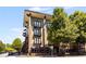 A multi-story building with a mix of retail and residential spaces, showcasing modern architecture at 5300 Peachtree Rd # 1311, Atlanta, GA 30341