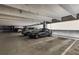 Well-lit parking garage with multiple parking spaces and visible space numbers for easy navigation at 5300 Peachtree Rd # 1311, Atlanta, GA 30341