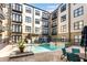 A serene pool area with lounge chairs and a hot tub is available for residents to enjoy at 5300 Peachtree Rd # 1311, Atlanta, GA 30341