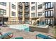 A serene pool area with lounge chairs and a hot tub is available for residents to enjoy at 5300 Peachtree Rd # 1311, Atlanta, GA 30341