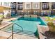 A serene pool area with lounge chairs and a hot tub is available for residents to enjoy at 5300 Peachtree Rd # 1311, Atlanta, GA 30341