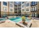 A serene pool area with lounge chairs and a hot tub is available for residents to enjoy at 5300 Peachtree Rd # 1311, Atlanta, GA 30341