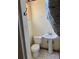 Small bathroom featuring a pedestal sink, standard toilet, and limited natural light, awaiting a remodel at 542 Sugar Hill Nw Dr, Marietta, GA 30060