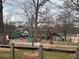 Playground at Lewis Park with a swing set and slide at 542 Sugar Hill Nw Dr, Marietta, GA 30060