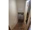 An unfinished stairwell leads to the lower level with visible wiring and access panels at 542 Sugar Hill Nw Dr, Marietta, GA 30060