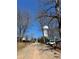 View of the street, water tower, and charming neighborhood houses from the property at 542 Sugar Hill Nw Dr, Marietta, GA 30060