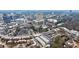 Aerial view of a building complex in a city, with various architectural styles and mature trees at 225 Dovecrest Dr, Atlanta, GA 30305