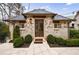 Charming guest house with brick facade, slate roof, and landscaped surroundings at 225 Dovecrest Dr, Atlanta, GA 30305