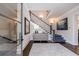 Welcoming foyer featuring a staircase, elegant decor, and a view into other areas of the home at 225 Dovecrest Dr, Atlanta, GA 30305