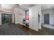 Functional mud room with storage cabinets, bench seating, and adjacent access to gym and garage at 225 Dovecrest Dr, Atlanta, GA 30305