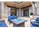 Stylish patio with comfortable seating around a modern fire pit, perfect for relaxation at 225 Dovecrest Dr, Atlanta, GA 30305