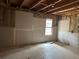 Unfinished basement with exposed framing, ready to be finished for additional living space at 2655 Fort Apachee Trl, Dacula, GA 30019
