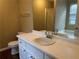 Bright bathroom with vanity, sink, toilet, shower and a tub at 2655 Fort Apachee Trl, Dacula, GA 30019