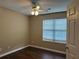Bedroom featuring natural light, a ceiling fan, and warm neutral paint at 2655 Fort Apachee Trl, Dacula, GA 30019